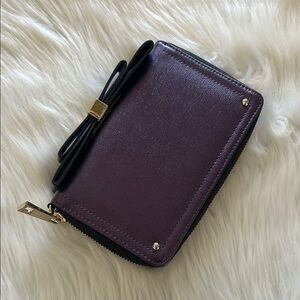 ALDO Purple Shimmer Wallet with Gold Hardware and Bow Detail